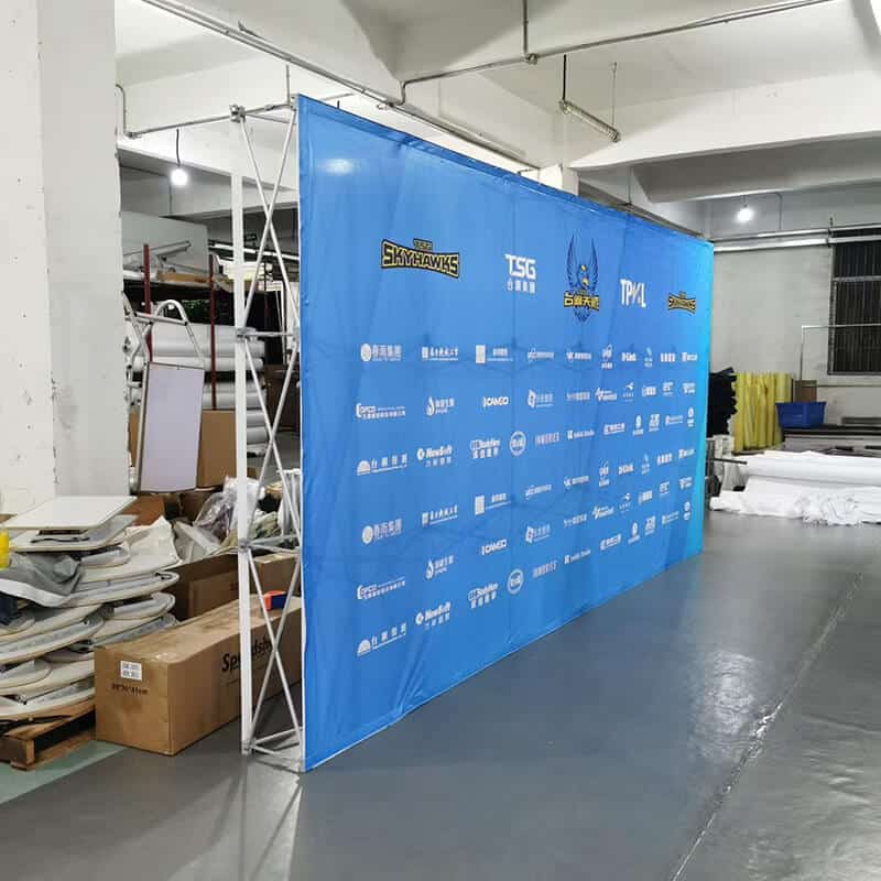 tension fabric pop up backdrop work blue repeat
